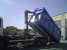 Container scarrabile da rifiuti con coperchio